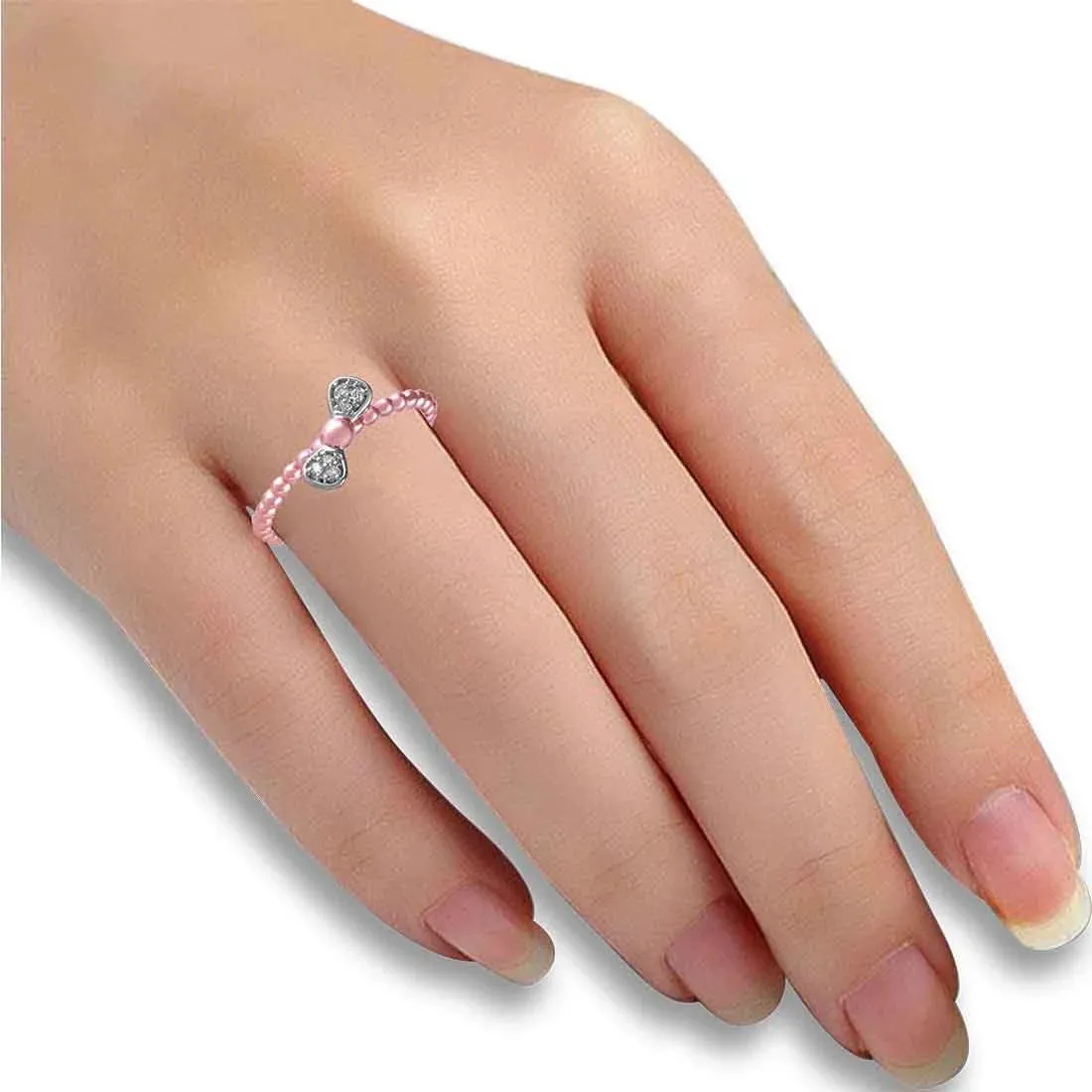 14K Rose Gold Ring With A Beaded Texture And A Bow-shaped Design With Diamond Accents