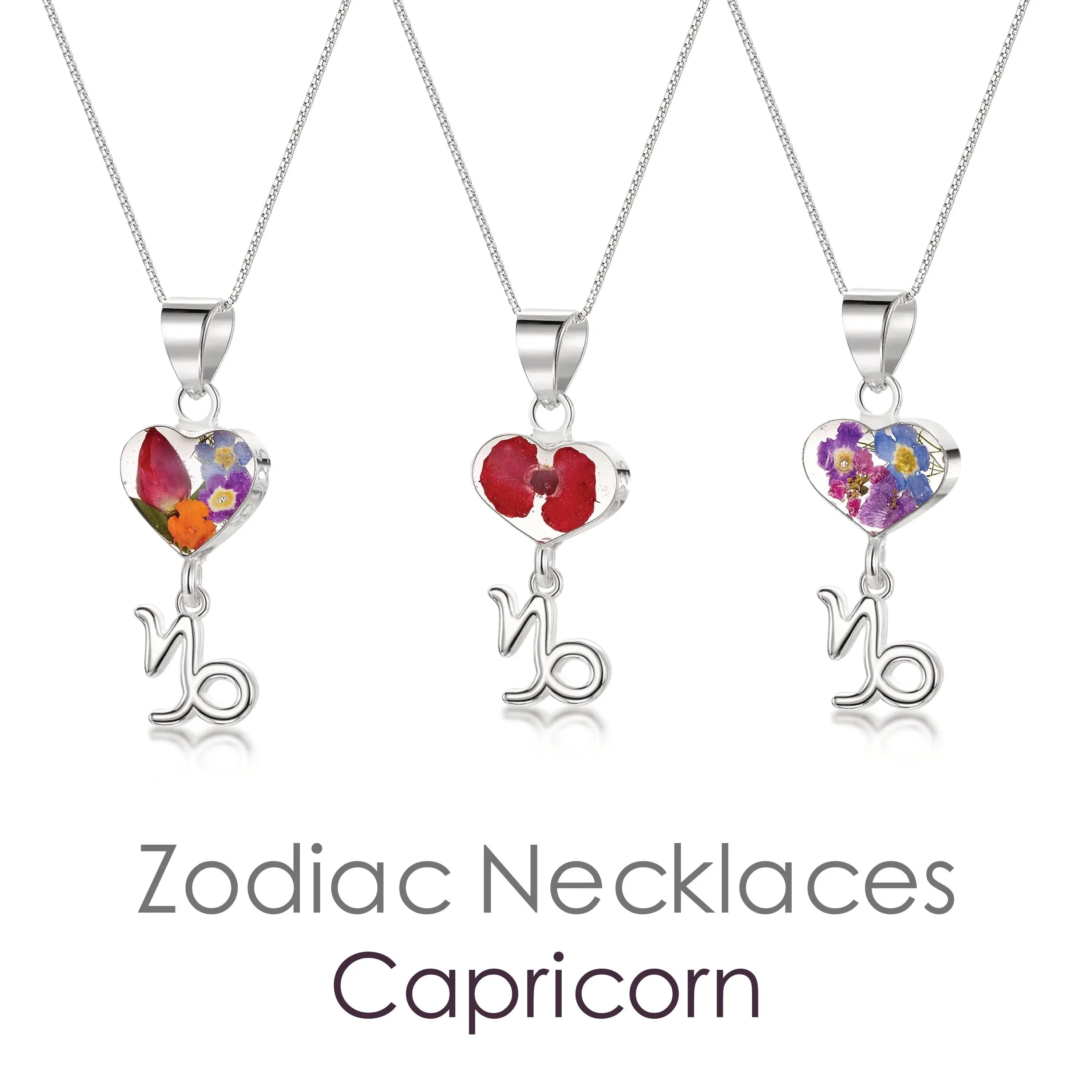 Capricorn Necklace - Sterling silver pendant with real flowers & a zodiac charm.   More Options...