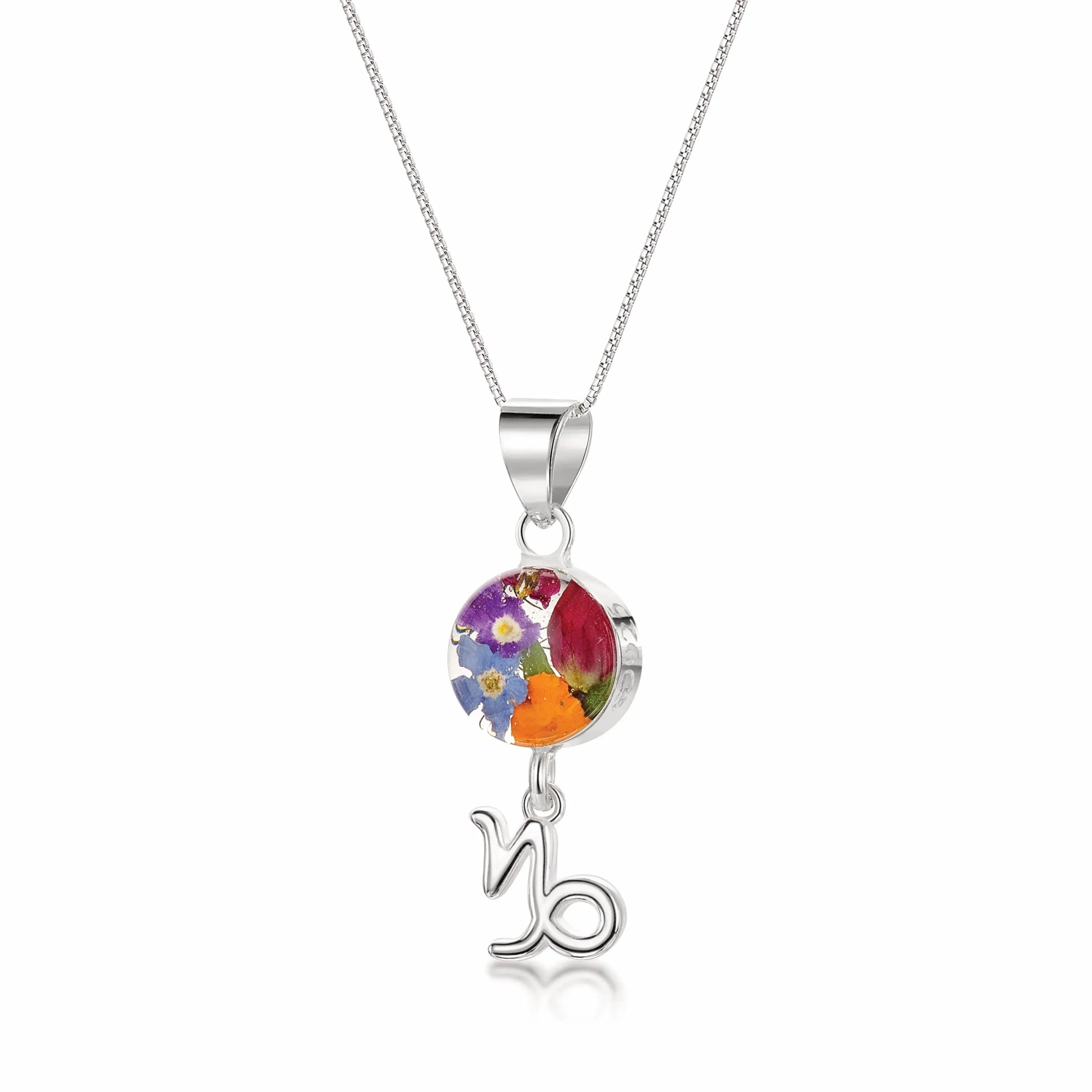 Capricorn Necklace - Sterling silver pendant with real flowers & a zodiac charm.   More Options...