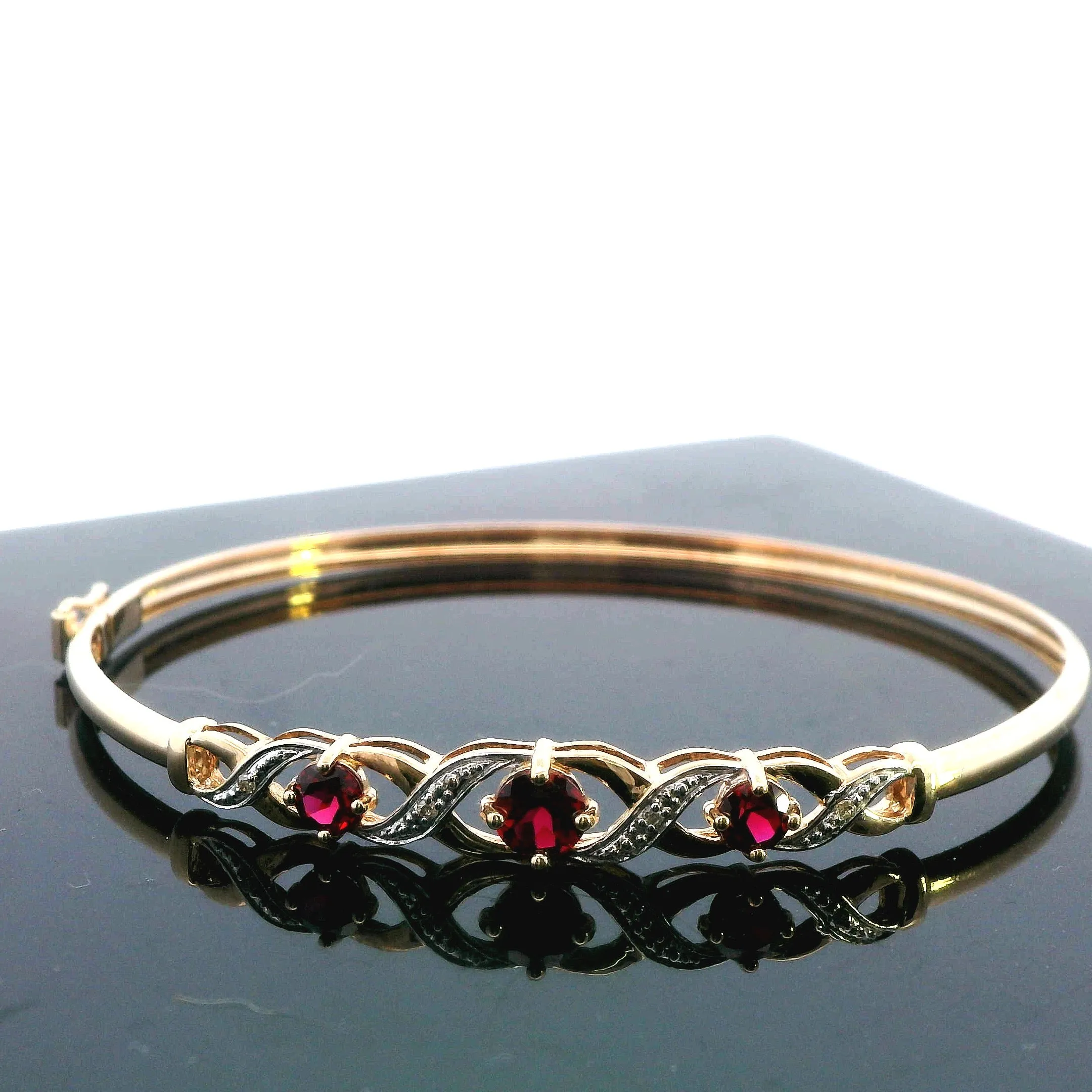 Elegant 9ct Yellow Gold Created Ruby Bangle - Stunning and Sophisticated