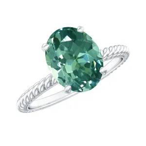 Oval Created Green Sapphire Solitaire Ring with Surprise Diamond