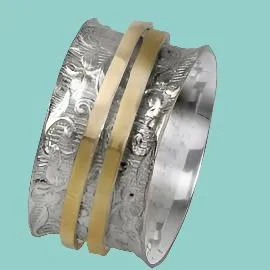 Spinning Ring Jewelry. Sterling Silver and 9kt Gold Ring.