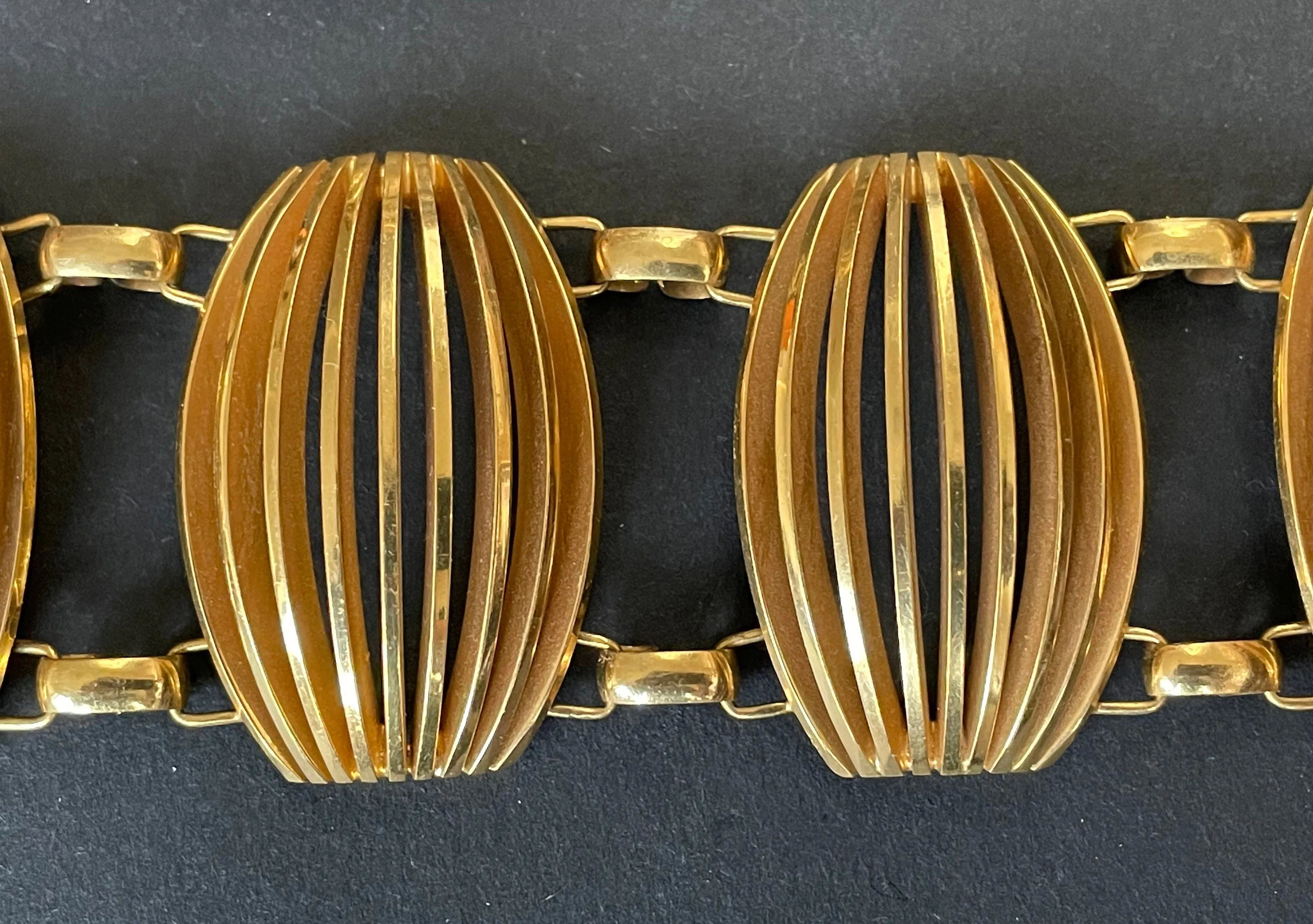 Vintage Art Deco machine age, geometric, architectural shiny gold tone statement bracelet and similar large brooch, perhaps French